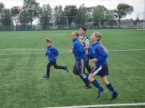 Laatste training S.K.N.W.K. JO10-1 (partijtje tegen de ouders) van woensdag 22 mei 2024 (11/133)